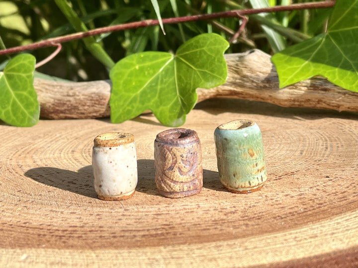 white, brown and green dread beads