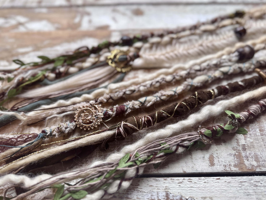 blonde dreadlocks with beads