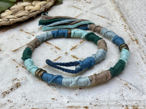 beige and blue dreadlock accessory