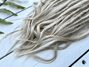 ice blonde dreadlock extensions, long wispy ends