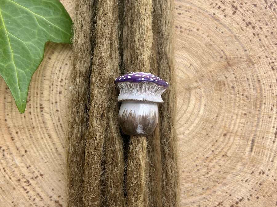 purple mushroom bead on dreadlock