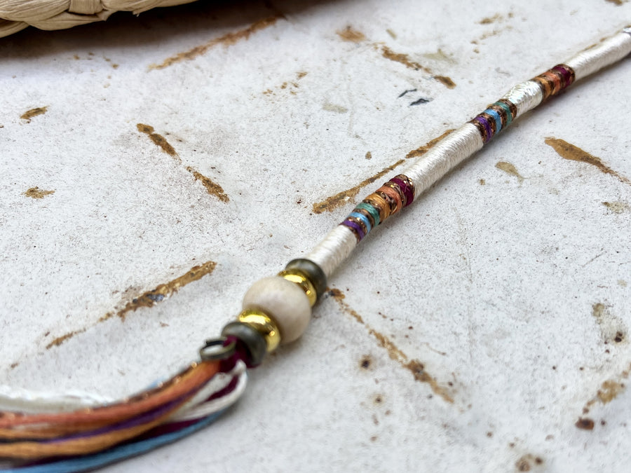 rainbow and white dreadlock accessory with beads