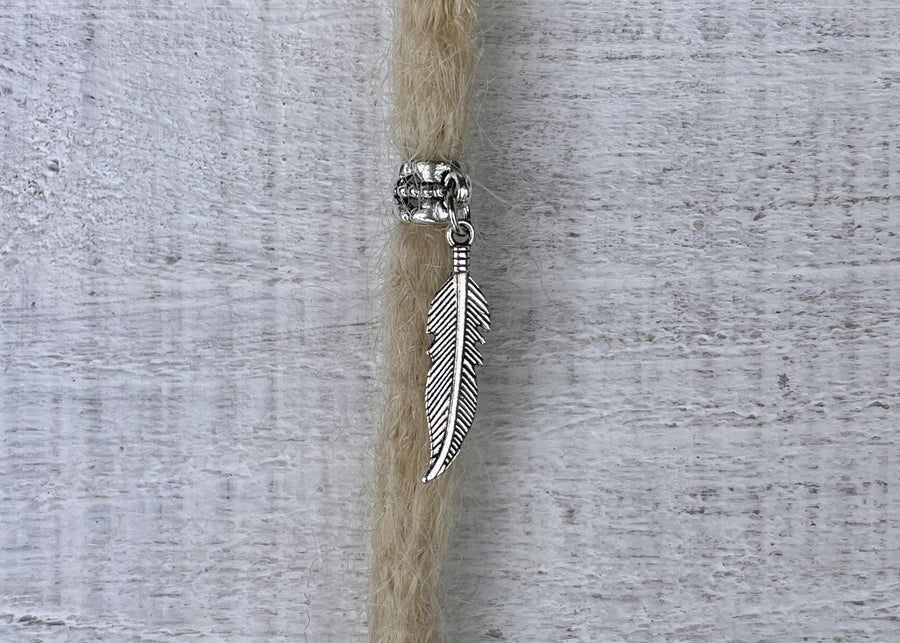 Feather dreadlock bead close up