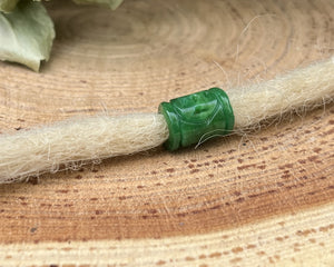 Natural jade dreadlock bead on dreadlock